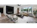 Open-concept living room with fireplace feature wall and stylish, comfortable seating arrangements at 1341 Hopewell Rd, Rock Hill, SC 29730