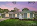 Charming single-story home with gray siding, a well-kept lawn, and inviting curb appeal at 3612 Cobbleridge Dr, Charlotte, NC 28215