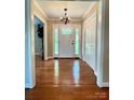 Entryway with hardwood floors, a chandelier, and access to other rooms at 3713 Saint Regis Dr, Gastonia, NC 28056
