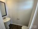 Powder room with pedestal sink and toilet at 3776 Yorkshire Pl, Terrell, NC 28682