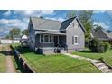 Attractive single-Gathering home with a well-maintained lawn, covered porch, and grey painted siding at 71 14Th Se St, Hickory, NC 28602