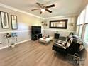 Comfortable living room with modern furnishings, a ceiling fan, and neutral décor at 903 Lakeview St, Kannapolis, NC 28083