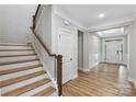Inviting foyer with hardwood floors, staircase, and modern finishes at Tbd Boomer Ct # 2, Statesville, NC 28677
