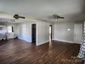 Open-concept living area with new flooring and plenty of natural light at 2607 Lowell Rd, Gastonia, NC 28054