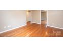 Spacious living room with hardwood floors and neutral paint, offering a warm and inviting atmosphere at 390 15Th Ne Ave, Hickory, NC 28601