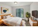 Cozy bedroom with a plush rug and large window creates a relaxing retreat with ample natural light at 845 Creek Bluff Rd, Rock Hill, SC 29732