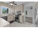 Functional kitchen with stainless steel appliances, a window over the sink, and neutral-toned cabinetry at 1860 Rosemont St, Salisbury, NC 28144