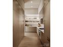 Spacious pantry with custom cabinets, shelving, and countertops for organized storage at 3630 Foxcroft Rd, Charlotte, NC 28211