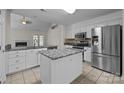Bright kitchen featuring granite countertops, stainless steel appliances, and a central island at 4705 Granite Ct, Indian Trail, NC 28079