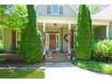 Inviting front porch with decorative accents and seating area at 503 Kinsey Creek Ct, Rock Hill, SC 29730