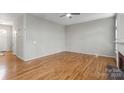 Spacious living room features hardwood floors, neutral walls, and ample natural light at 5311 Courtfield Dr, Indian Trail, NC 28079