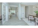 Bright entryway with a view into the open living space, showcasing modern flooring and neutral tones at 1033 Harrogate Dr, Bessemer City, NC 28016