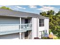 Charming condo featuring a balcony, light siding, and a newly installed roof at 11163 Harrowfield Rd # 8198, Charlotte, NC 28226