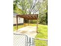 Backyard view of a covered carport, offering convenient parking and shelter at 207 Morris St, Kings Mountain, NC 28086