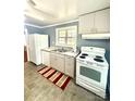 A kitchen featuring appliances and a window with natural light at 207 Morris St, Kings Mountain, NC 28086