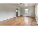 Inviting living space featuring classic hardwood floors and abundant natural light at 2106 A Ave, Charlotte, NC 28216