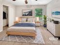 Serene bedroom featuring a comfortable bed, ample natural light, and neutral tones creating a relaxing atmosphere at 305 Augustus Ln, Mount Holly, NC 28120