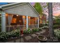 Inviting covered patio with outdoor seating, perfect for entertaining at 3301 Mcpherson St, Waxhaw, NC 28173