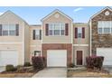 Charming townhome featuring a two-car garage and a welcoming front porch at 3623 Danvers St, Charlotte, NC 28213