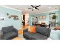 Cozy living room featuring fireplace, hardwood floors and lots of natural light at 8013 Sheckler Ln, Matthews, NC 28104