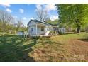 Exterior view of a one-story home featuring a well maintained lawn at 2679 Providence Mill Rd, Maiden, NC 28650