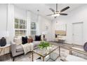 Cozy living room with neutral decor, large windows, and stylish furnishings at 538 Williamson St, Charlotte, NC 28208