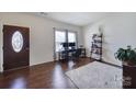 Cozy living room with hardwood floors and natural light at 1717 Mill Creek Sw Ln, Concord, NC 28025