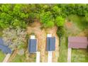 High-angle aerial shot of the houses, revealing their roof details and proximity to foliage at 2043 Greenoak Dr, Shelby, NC 28152