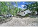 This single-story home includes a side deck that's perfect for enjoying the outdoors at 216 W 16Th St, Kannapolis, NC 28081
