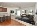 Bright living room boasts natural light, neutral tones, stylish furnishings, and an open floor plan at 226 Scenic View Ln, Matthews, NC 28104