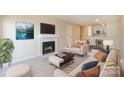 Inviting living room with fireplace, neutral colors, and open floor plan at 368 Northwest Dr, Davidson, NC 28036