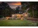 Expansive backyard view highlighting a well-maintained lawn and outdoor entertaining area at 542 Lochaven Rd, Waxhaw, NC 28173