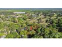 Aerial view of home near Rock Hill Country Club & Golf Course amidst lush greenery at 680 Lakeside Dr, Rock Hill, SC 29730