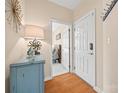 Charming entryway with hardwood floors, leading to a bedroom; offering a welcoming ambiance at 7822 Village Harbor Dr, Cornelius, NC 28031
