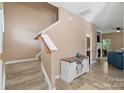 Inviting entryway featuring wood floors, staircase, and decorative accents at 1097 Constitution Park Blvd, Rock Hill, SC 29732