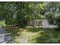 Single-story home, mature trees, and an opportunity for revitalization and enhancement at 433 E Geroid St, Salisbury, NC 28144