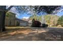 Two-story home featuring an attached garage and covered entry way at 1404 Oakdale Rd, Rock Hill, SC 29730