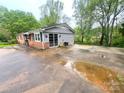 Exterior view of home addition featuring sliding glass door to the backyard at 2116 Dana Pl, Shelby, NC 28152