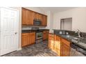 Well-equipped kitchen with stainless steel appliances, granite countertops, and ample cabinet space at 10318 Caldwell Depot Rd, Cornelius, NC 28031
