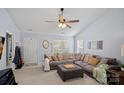 Bright and spacious living room featuring plush sectional sofa, lots of natural light and tile entryway at 105 Sterling Ter, Mooresville, NC 28115