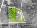 Aerial view of property lot lines and surrounding trees and road at 211 Hershel Lackey Rd, Lincolnton, NC 28092
