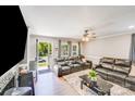 Inviting living room with modern furniture, hardwood floors, and natural light at 2614 Thornton Rd, Charlotte, NC 28208