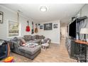 Comfortable living room with wood floors, gray sectional and media center at 705 Sumter St, Lancaster, SC 29720