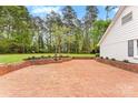 Spacious brick patio perfect for outdoor entertaining and relaxation at 103 Colonel Richard Rankin Dr, Stanley, NC 28164