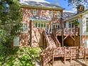 Spacious backyard featuring a multi-level deck perfect for outdoor entertaining at 10609 Oak Pond Cir, Charlotte, NC 28277