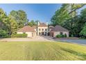 Stunning home with large lawn, circular drive, and attached garages at 3005 Dream Catcher Cir, Fort Mill, SC 29715