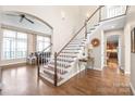 Bright foyer with hardwood floors, staircase, and high ceilings that create an inviting entrance at 3005 Dream Catcher Cir, Fort Mill, SC 29715
