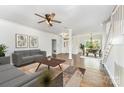 Bright living room with hardwood floors, neutral decor, and an open layout at 426 Saint Michaels Way, Fort Mill, SC 29708