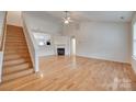 Spacious living room with hardwood floors, fireplace and stairs at 835 Holdcroft Ln, Rock Hill, SC 29730