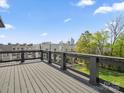 Stunning rooftop deck boasts city views and modern cable railing detail at 913 Van Every St, Charlotte, NC 28205
